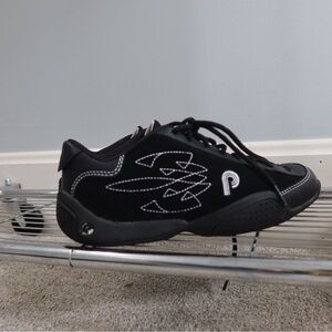 Black piloti Sneakers with‎ White Stitching